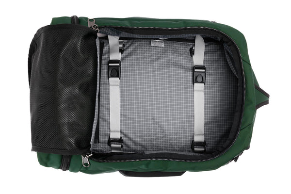 A Techonaut 30 with a Wilderness (dark green) exterior with Northwest Sky (light grey with white grid pattern) 200 Halcyon interior.